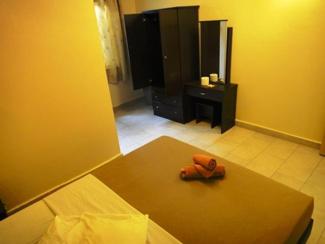 Eight Mentigi Guesthouse Cameron Highlands Quarto foto