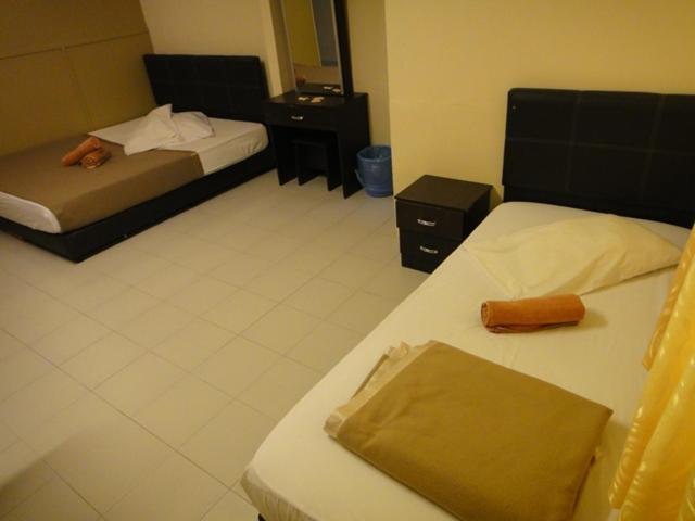 Eight Mentigi Guesthouse Cameron Highlands Quarto foto